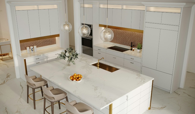 A kitchen with a center island and pendant lights